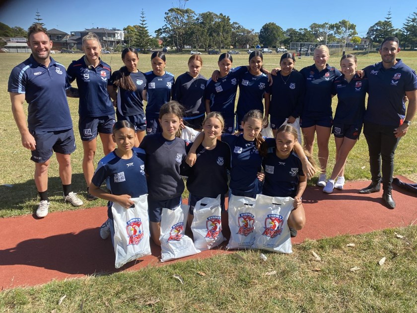 Growing the Future: Head of Pathways Blake Cavallaro (far right) and Roosters players Brydie Parker (second from left), Ally Bullman (third from right) and Jada Taylor (second from right) visited Matraville Sports High School to present to the next generation of female stars. 