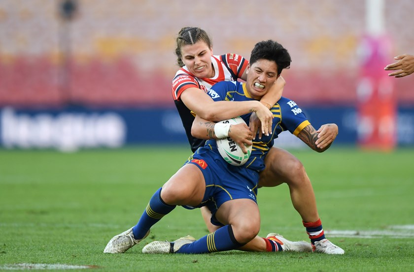 Defensive Fortitude: Jess Sergis (pictured tackling Gayle Broughton) had some memorable moments from the match, including two try-saving tackles. 