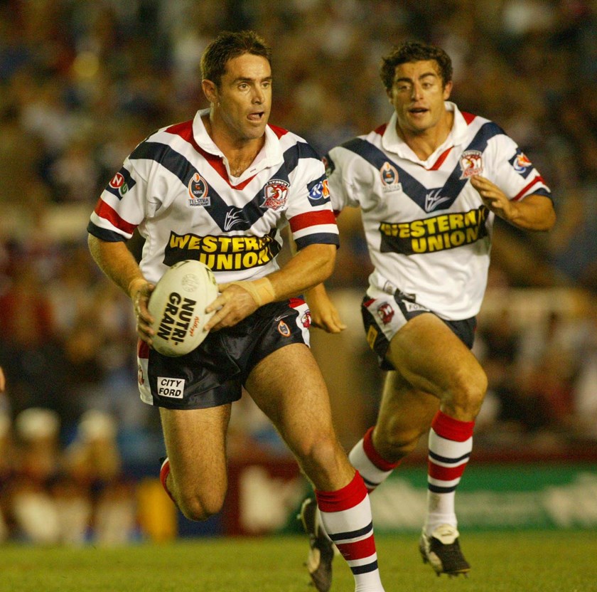 Brad Fittler and Anthony Minichiello against the Newcastle Knights in 2003.